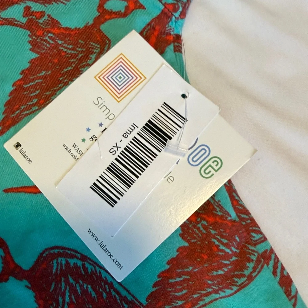 LuLaRoe Irma Teal and Red Patterned Top